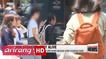 Pedestrians checking smartphones on the go exposed to increased risk of accidents