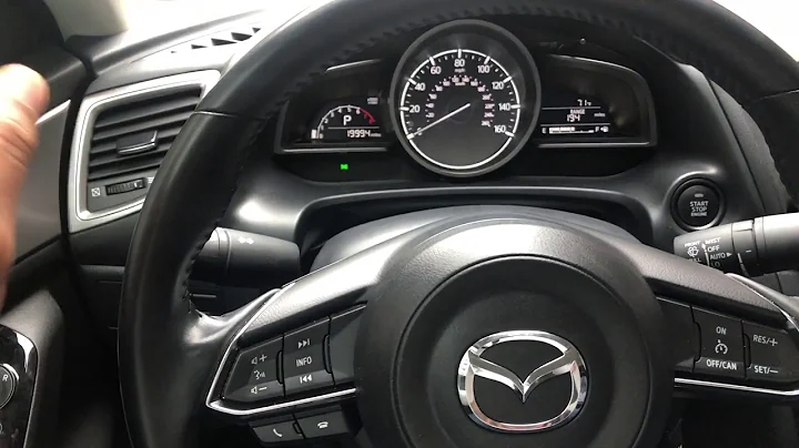 Mazda 3 - Adjusting side view mirrors