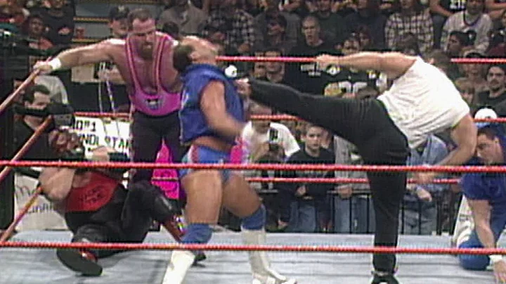 Steve Blackman runs in from the crowd to save Vader