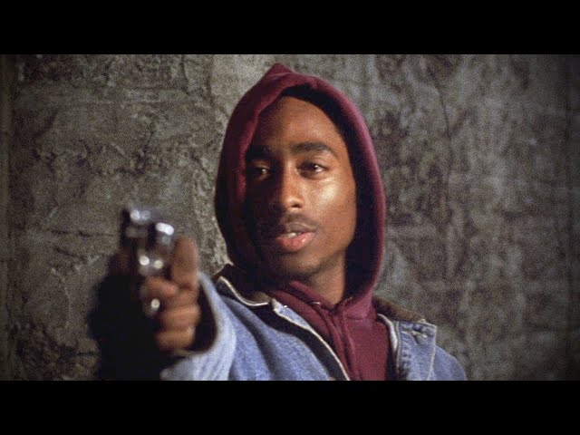 tupac with gun