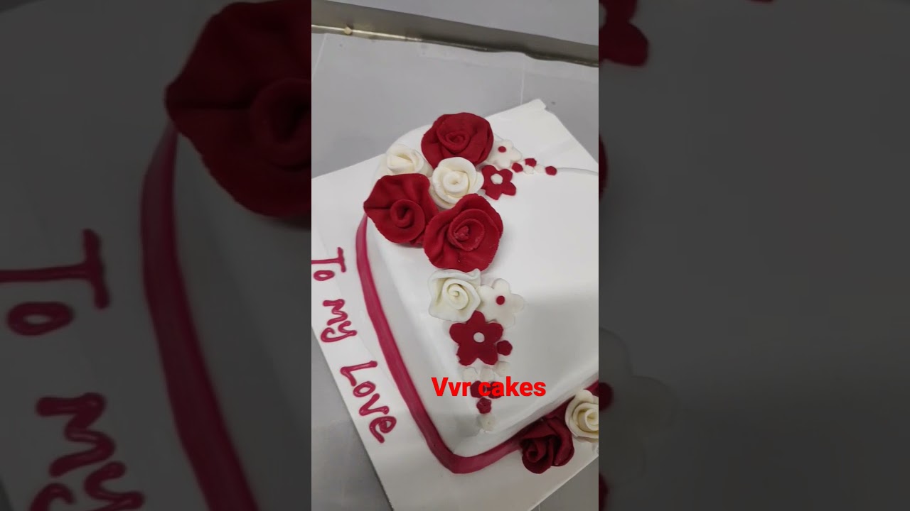 Heart shape cake with fondant flowers 