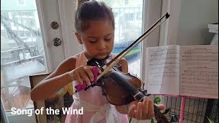 Girl play violin - Song of the Wind page 28 Suzuki July 2021