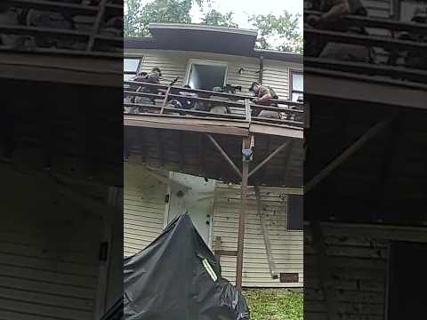 U.S. Marshals fall during SWAT raid when porch gives way