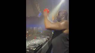 Shaq makes a freethrow while DJ’ing in a club; \