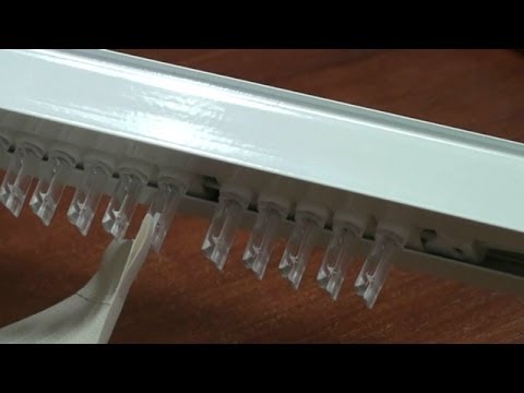 Видео: Как снять лопатки с вертикальных жалюзи?