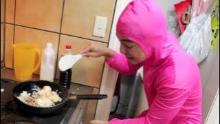 PINK GUY COOKS FRIED RICE AND RAPS