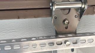 buckling popping garage door panel quick easy cheap repair