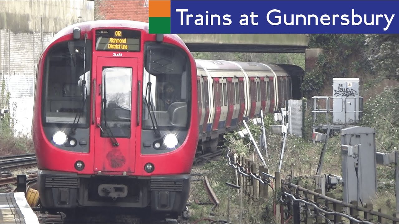 London Overground And District Line Trains At Gunnersbury