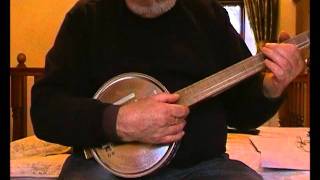 4 string cookie tin banjo