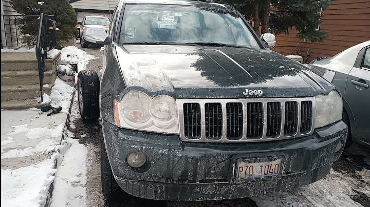 2014 jeep grand cherokee rear shock replacement