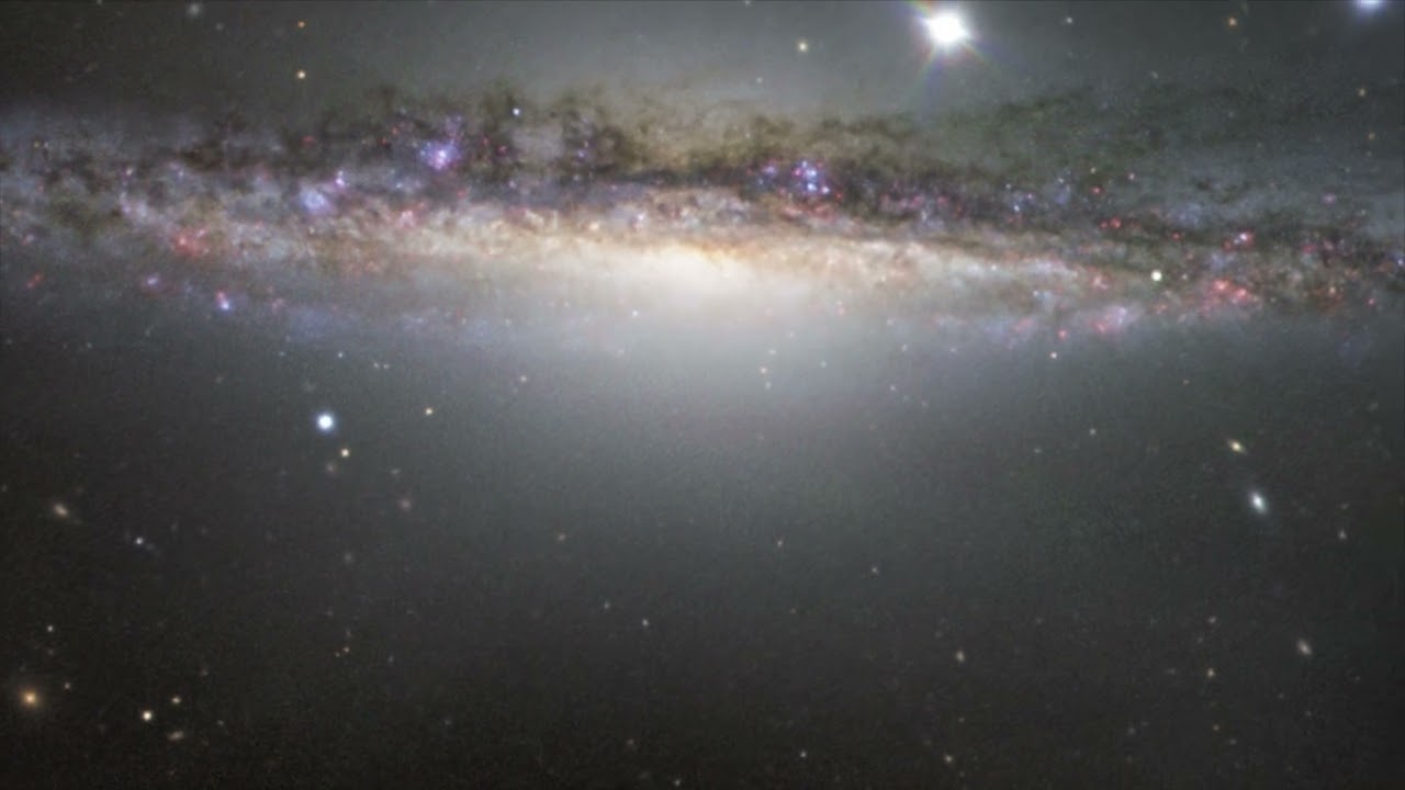 ESO: Panning across a new image of NGC 1055