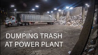 Trash piling up unloading 22 tons of trash at the power plant - WALL POV
