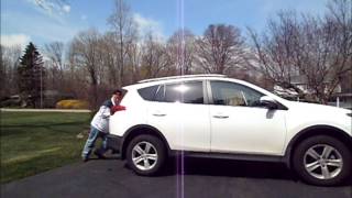 Terrifying Strength Stops Runaway 3500 Pound SUV In Reverse