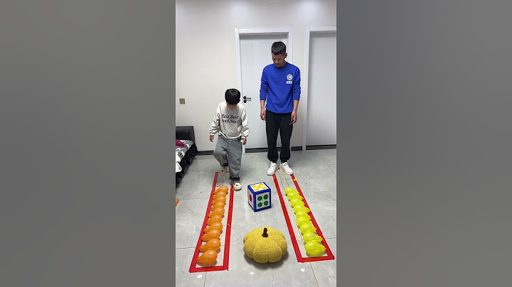 扔骰子踩爆气球，没想到儿子这么快就赢得了比赛！#萌娃#亲子#亲子日常#搞笑#爸爸带娃#funny