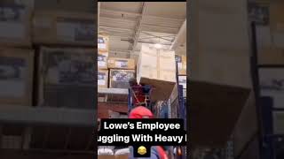 Famous Lowes Employee Struggling With Heavy Box While Co Workers Watch And Coach From Sidelines Profile