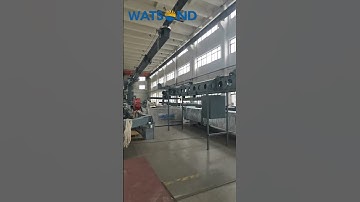 A huge Building Maintenance Unit (BMU) has just been installed and is about to be tested