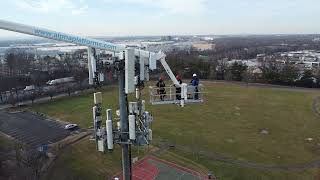 Cell tower 360-access with a swiveling extra-large boom lift basket