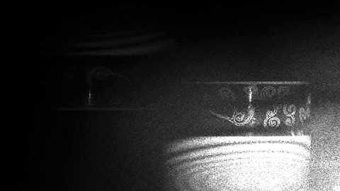 Coffee cup heating viewed through holographic interferometry