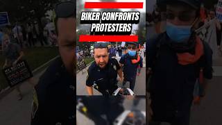 Biker confronts protesters blocking road #shorts #traffic #biker #motorcycle