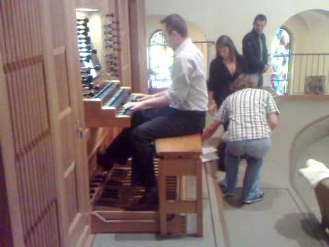 Hubert Niewiadomski at the organ at the St. Theres...