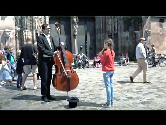 A Little Girl Plays For A Street Musician And Gets The Best Surprise In Return class=