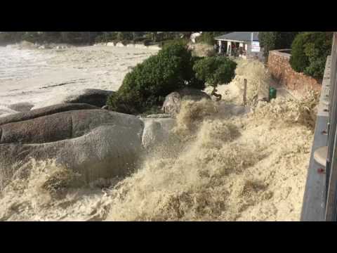 Waves crashing into Clifton Lifesaving Club