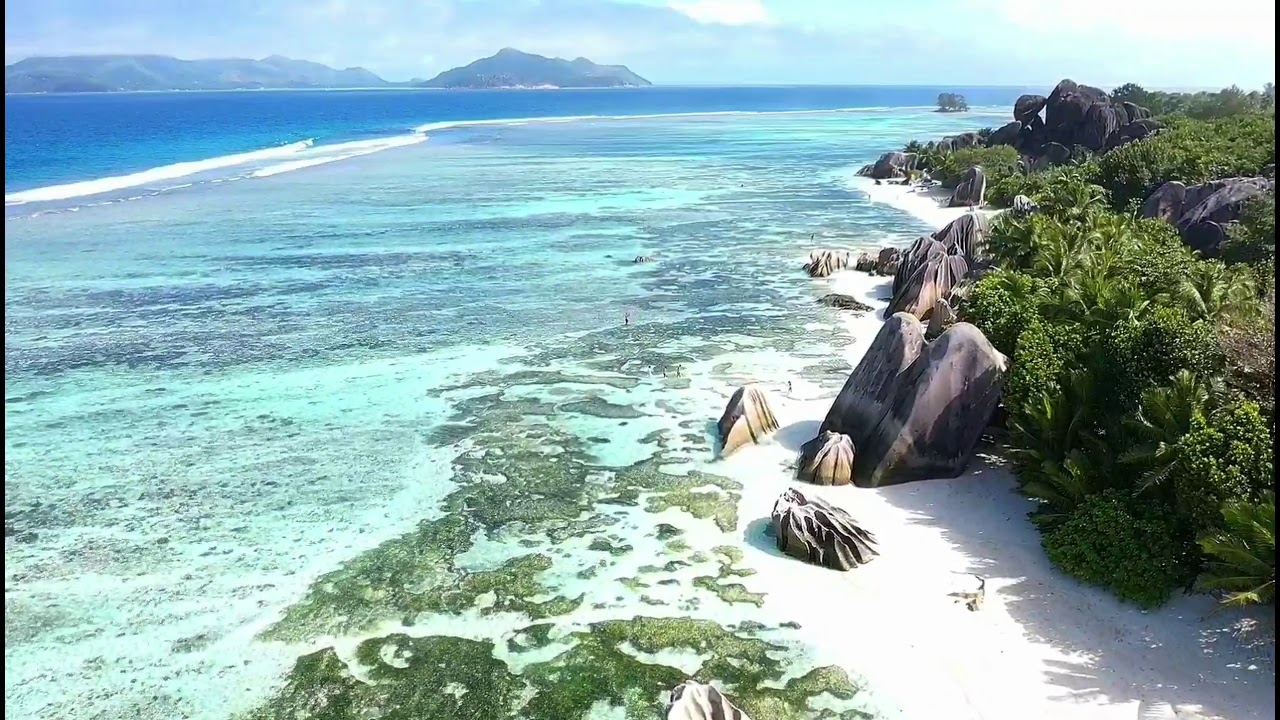 Anse Source d'Argent by drone in 4K, La Digue, Seychelles, 31st of July ...