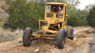 CAT 12 Motorgrader Blade Work