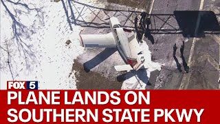 Plane lands on Long Island s Southern State Parkway