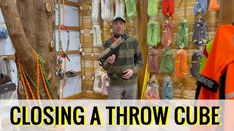 Opening and closing a throw line cube