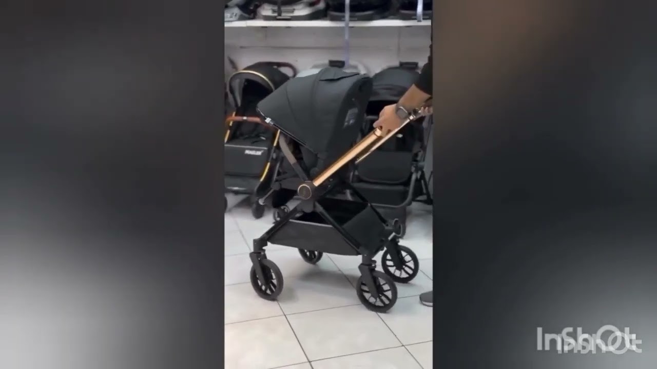 Прогулочная коляска с перекидной ручкой kidilo d900