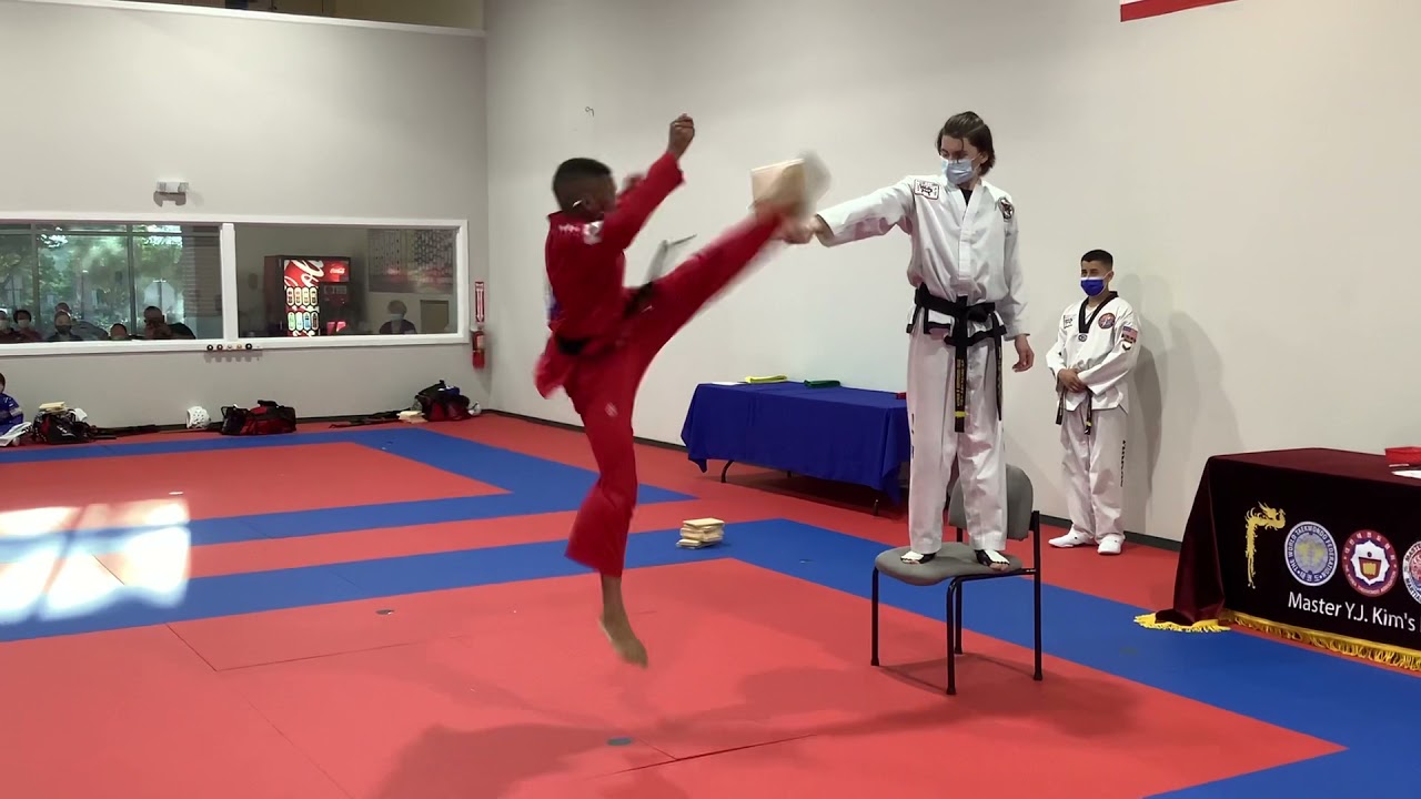 Braeden’s left leg jumping spinning side axe kick