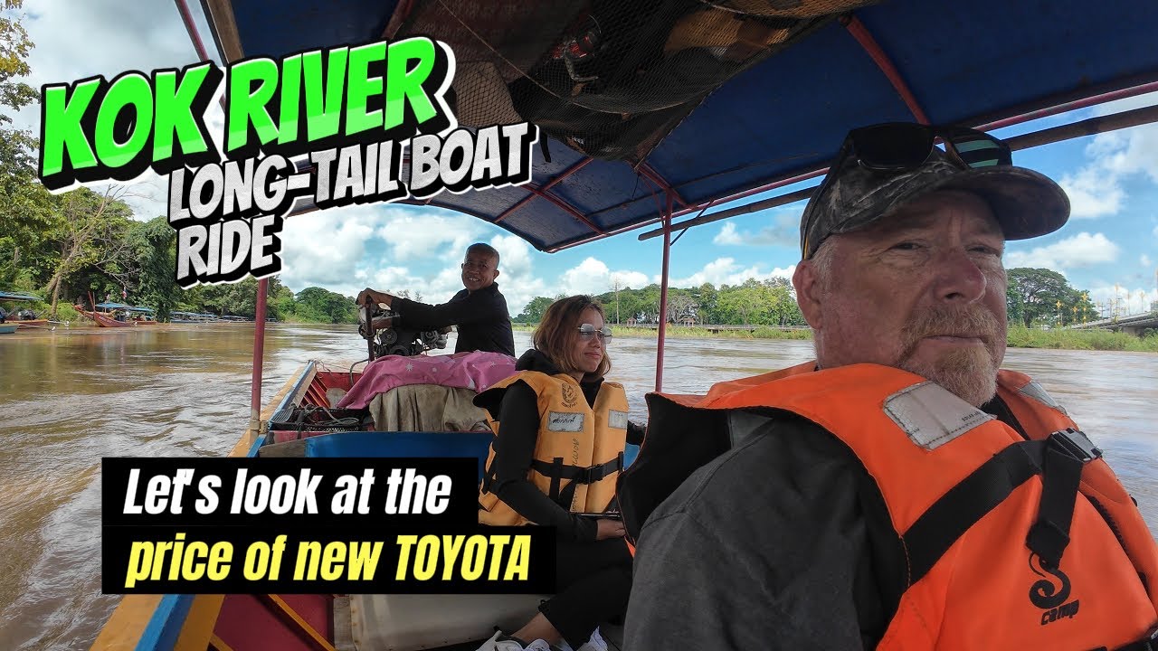 Today we take a Kok River boat ride, visit the Toyota dealer and feed the caddies.