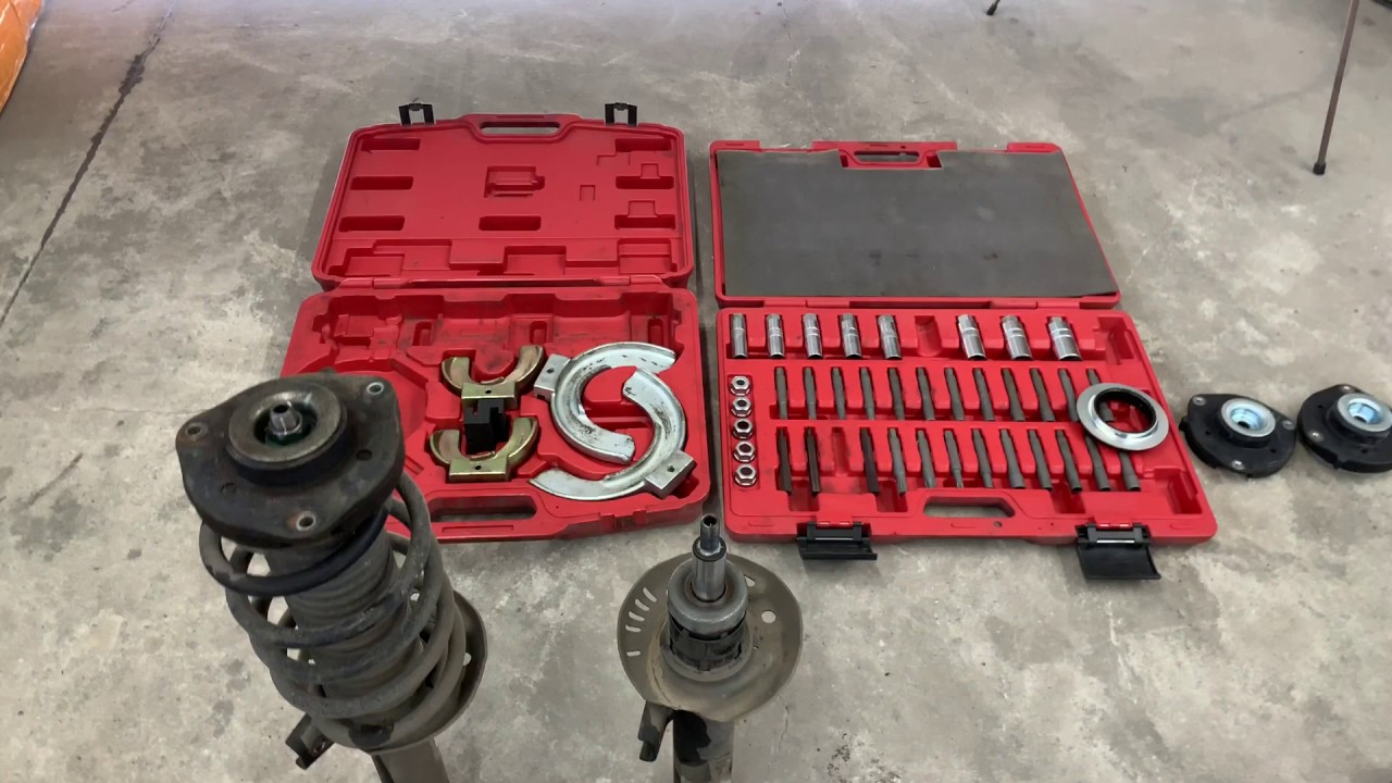 Как поменять передние амортизаторы на VOLKSWAGEN PASSAT B7 - YouTube