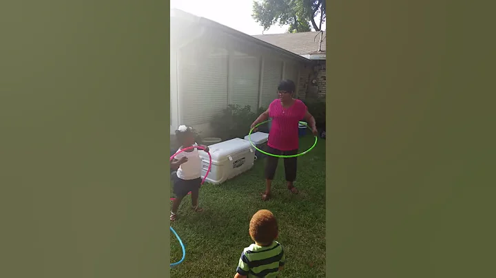 Nanny Giving Hula Hoop Lessons