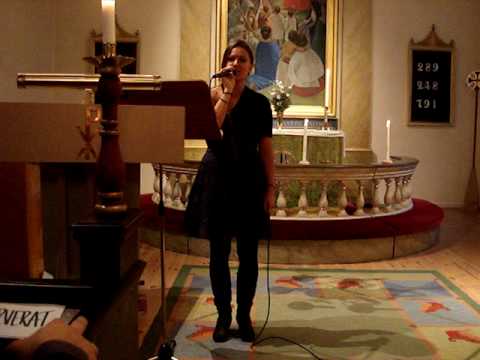 Sandra Gee singing in Church