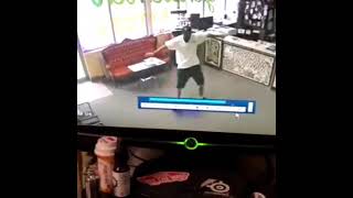 Guy rides hoverboard for the first time falls off and breaks tablet (Security camera)