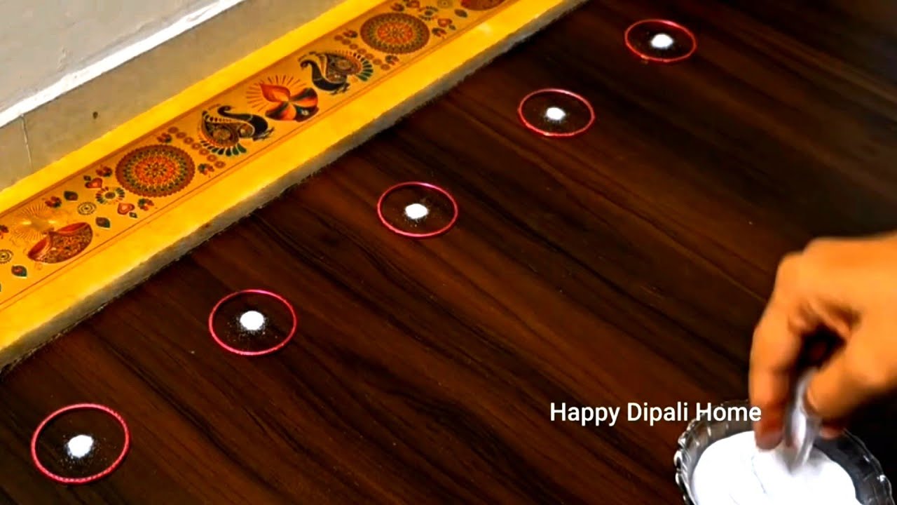 Beautiful Border Rangoli Designs. Door side border rangoli. Festival kolam muggulu. Muggu Border. 