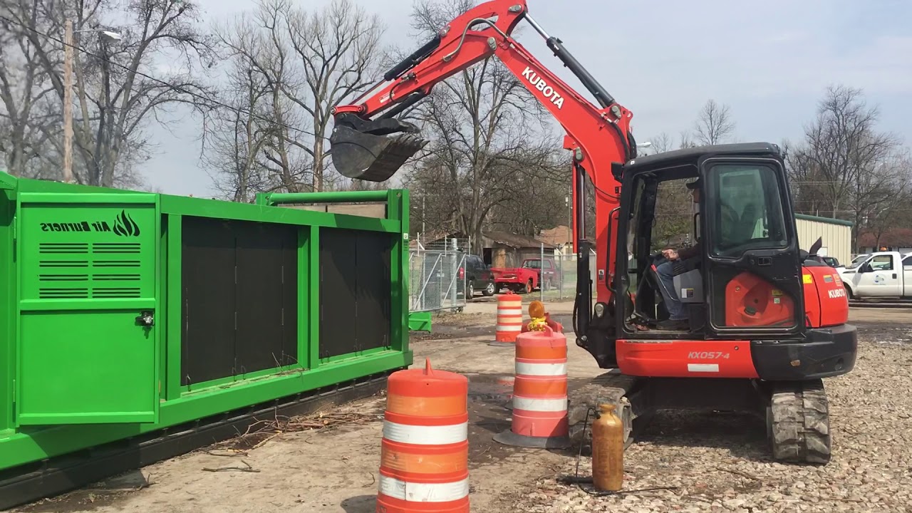 Blytheville Public Works Kubota dropping fuel into air burner YouTube