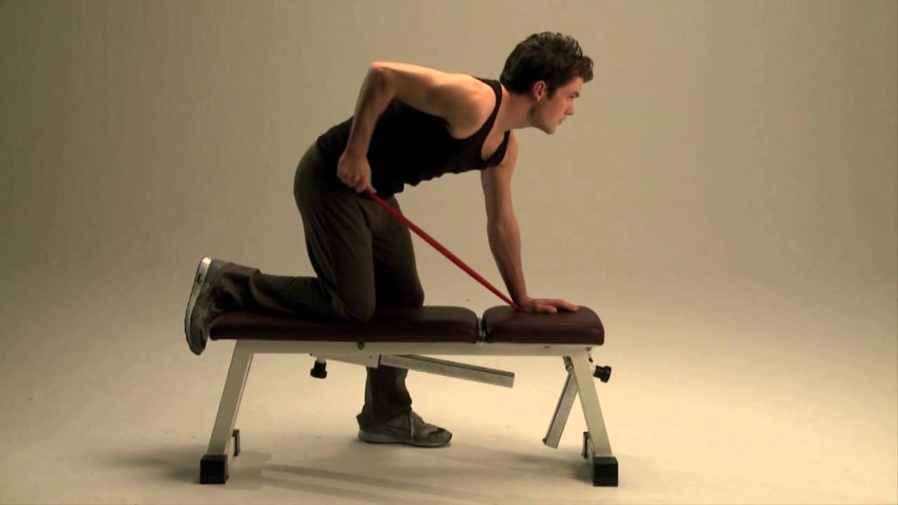 Triceps kick back dynaband on bench - YouTube