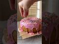 Giant Donut Cake filled with berry jam and coated with sweet buttercream and of course, sprinkles!