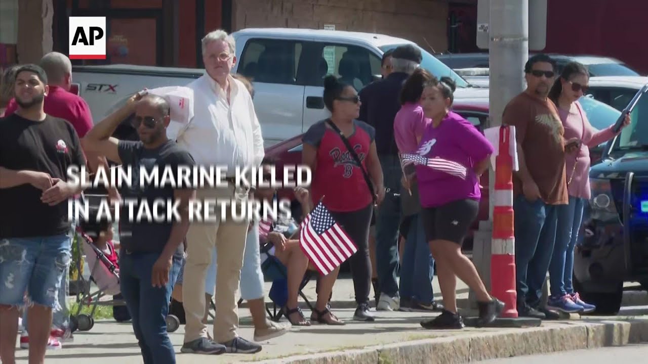 Slain Marine killed in attack returns home - YouTube