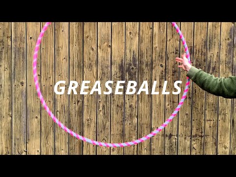Dieses Video zeigt unser Hula Hoop Modell &quot;Greaseballs&quot; in Bewegung bei Sonnenlicht. Tapes: 24 mm neon pink grip / 24 mm grey gripDieses Modell ist erhältlic...