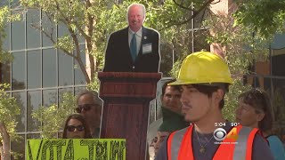 Protesters Rally Outside Rep. Coffman's Office