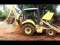 COMO OPERAR A RETROESCAVADEIRA NEW HOLLAND  B95B