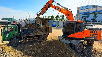 Máy xúc múc đất đá, xe ben vận chuyển, xe trộn bê tông cùng làm việc trong công trường ARES TV
