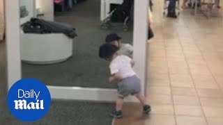 Hilarious video shows toddler's first encounter with a mirror