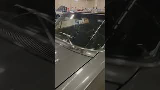 What year is this beautiful grey Chevy Impala lowrider?