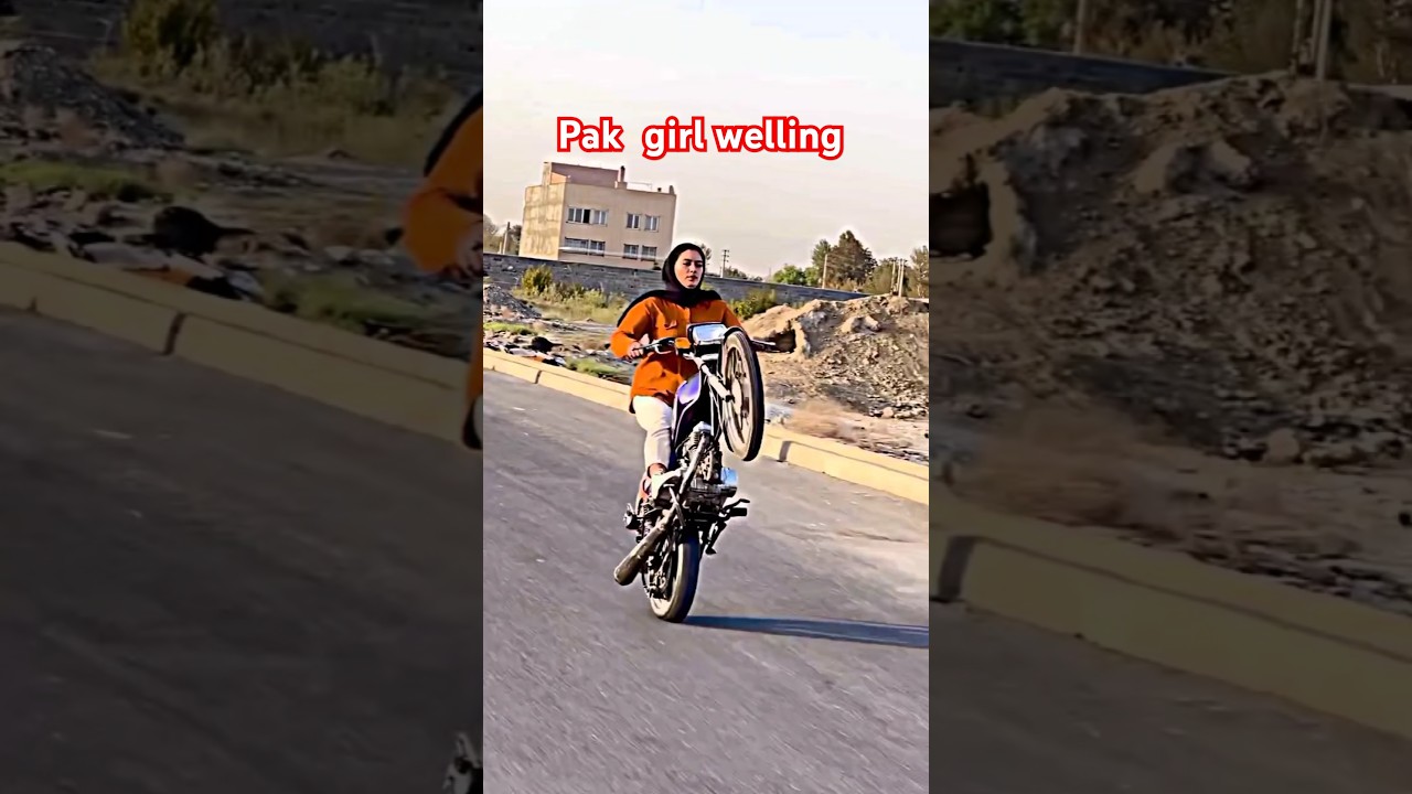 A Pakistani girl perform bike wheeling stund