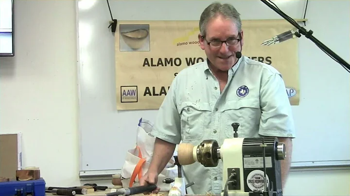 Kirk Acosta demonstrates his process for turning a...